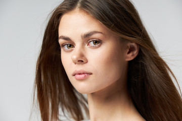 Naklejka premium portrait of pretty woman attractive look close-up long hair 