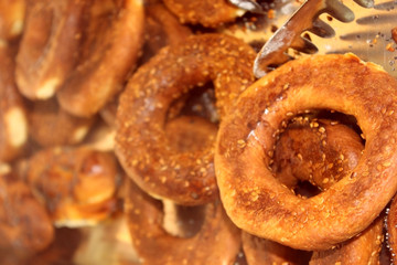 Traditional Turkish crispy bagel with sesame, simite. Freshly baked buns. View from above. Sweet homemade pastries. Breakfast. Background. Food.