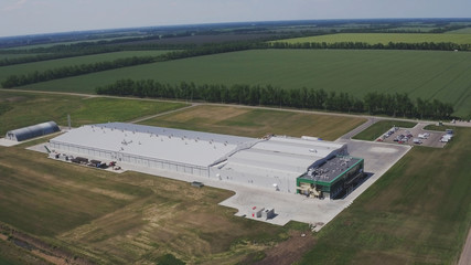 Fototapeta premium Aerial or flying over the mushroom production farm. Modern agriculture. Food production. Vegetarian food