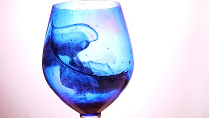 purple blue glass with drink