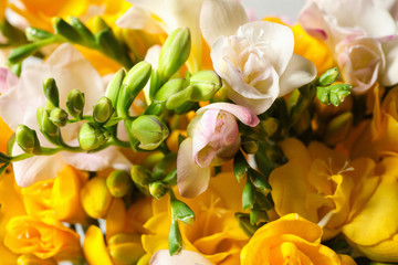 Obraz na płótnie Canvas Beautiful colorful freesia bouquet as background, closeup