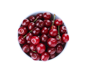 Sweet juicy cherries in bowl isolated on white, top view