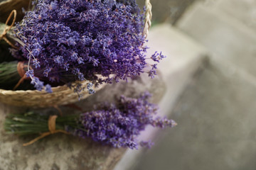 Wicker basket with beautiful lavender flowers outdoors, closeup