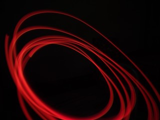 light painting Photography, long exposure, ripple curve and circle against black background