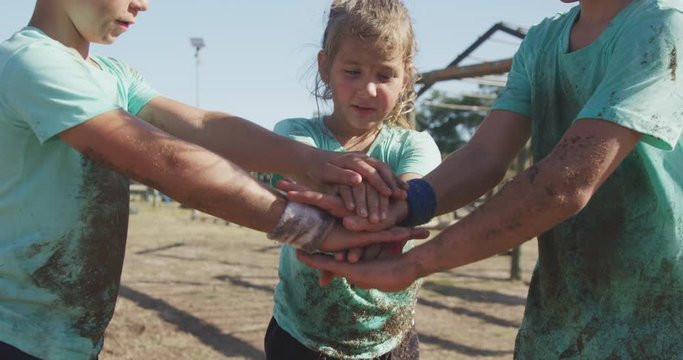 Group of Caucasian boys and girls at boot camp together