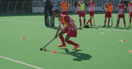 Hockey players preparing before a game - Powered by Adobe