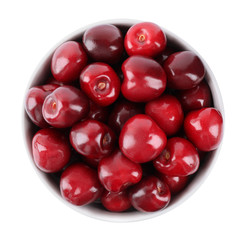 Tasty ripe red cherries in bowl isolated on white, top view