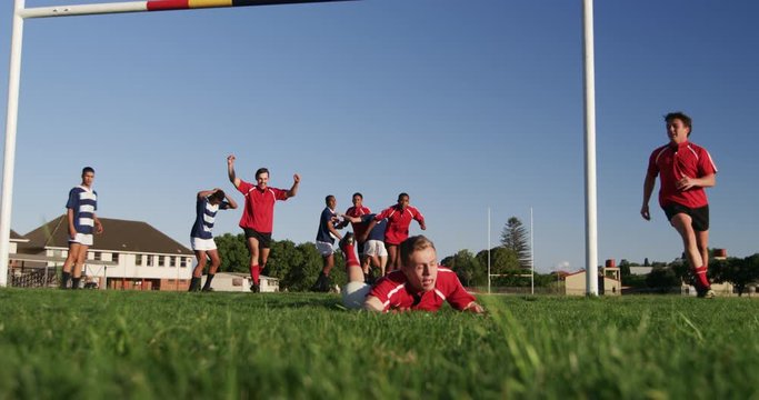 Rugby players having match on the field