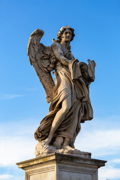 Angel statue on the Saint Angelo Bridge over Tiber river in Rome, Italy