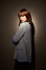 Charming girl in evening wear gesticulate with hands