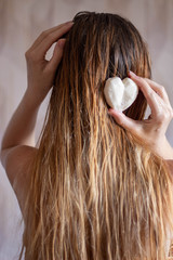 young woman with long hair and solid shampoo