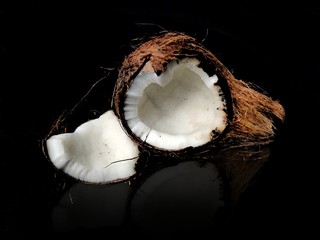 Coconut cut pise isolated on Black background with revelation 