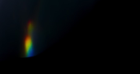Prism Rainbow Light Flares Overlay on Black Background