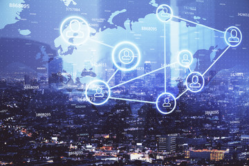 Multi exposure of social network theme drawing and cityscape background. Concept of people connecton.