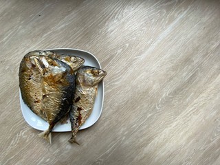 fish on a wooden board