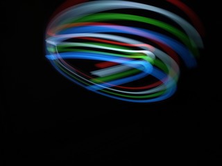 light painting Photography, long exposure, ripple curve and circle against black background