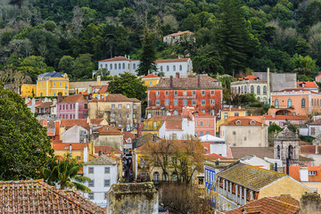 Fototapeta na wymiar Aerial view of the historic part of Sintra, Portugal. Sintra is a municipality in the Grande Lisboa sub region, delightful Portuguese town that has an abundance of wonderful tourist attractions.