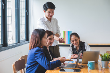 Group of young asian entrepreneur in business casual brainstorming in the office