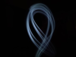 light painting Photography, long exposure, ripple curve and circle against black background