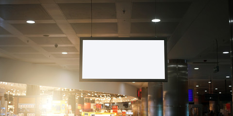 advertising empty monitor with mock-up hanging in center mall building