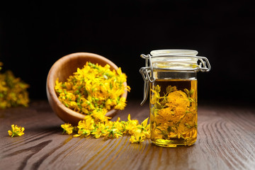 Herbal oil extract or infusion of Hypericum perforatum herb flowers