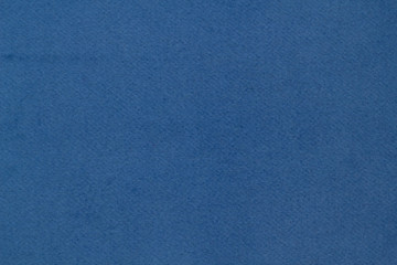 Cloth coats colorful. The texture of the coat fabric close-up.