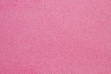 Cloth coats colorful. The texture of the coat fabric close-up.