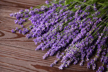 Lavender flowers bouquet on wooden background