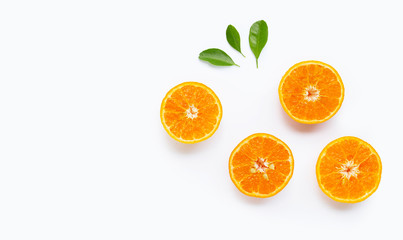 Oranges on white background. Copy space
