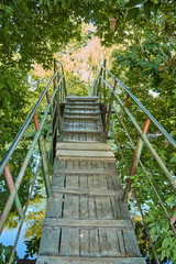 Stairs to bridge over river