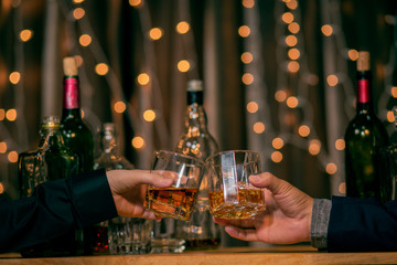 Barman pouring whiskey whiskey glass beautiful night