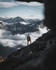 hiker on the top of mountain