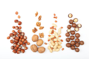 Set of different nuts on a light background.
