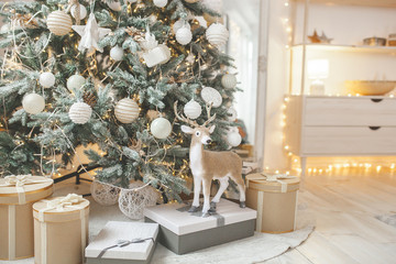 Christmas tree background. Closeup still of spurs with handmade decor. New year interior