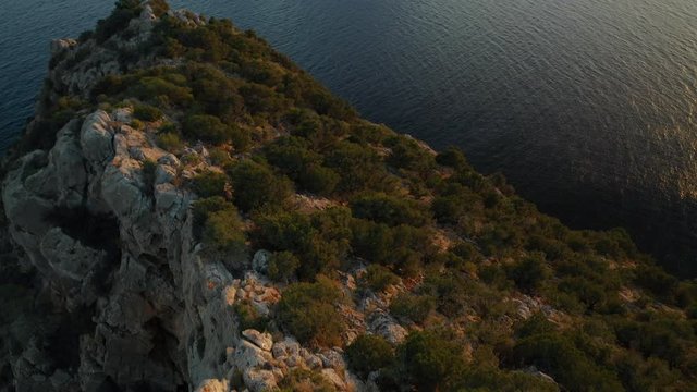 Aerial video of the island of Es Vedr&agrave; during sunset. Off the coast of Ibiza.