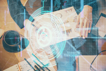 Multi exposure of woman's writing hand on background with data technology hud. Big data concept.