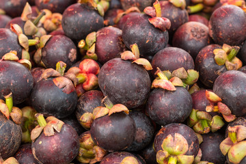 Mangosteen fresh fruit, mangosteens in the market.