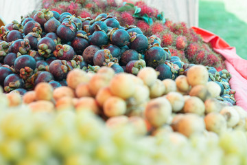 Mangosteen fresh fruit, mangosteens in the market.