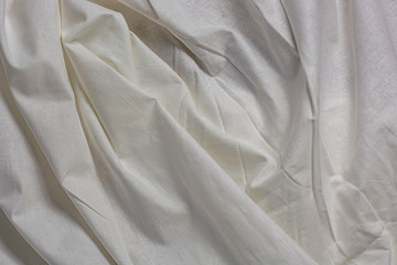 white crumpled cotton fabric textured background close-up