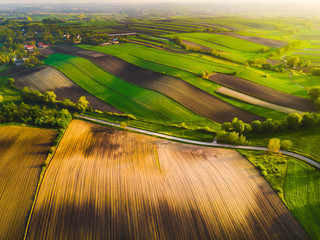 Nida Valley called Ponidzie in spring sunset time, drone aerial photos of fields.