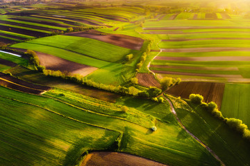 Nida Valley called Ponidzie in spring sunset time, drone aerial photos of fields.