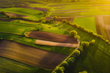 Nida Valley called Ponidzie in spring sunset time, drone aerial photos of fields.