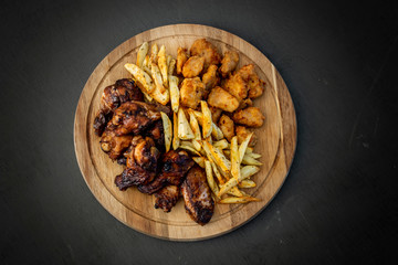 Honey Soy Chicken Wing Nibbles, Fried Chicken with Salad and Potato Chips