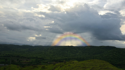 Landscape nature mountain in india with rainbow.