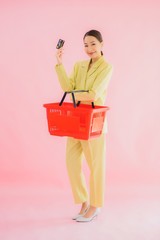 Portrait beautiful young asian woman with grocery basket