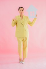 Portrait beautiful young asian business woman show home or house sign