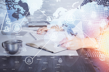 Social network theme hologram with businessman working on computer on background. Concept of world wide web. Double exposure.