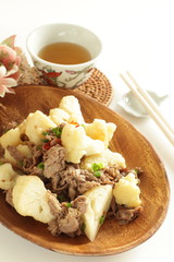 Chinese food, beef and cauliflower stir fried with chilli pepper on hot