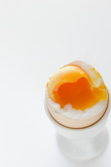 soft boiled egg in egg stand for breakfast 