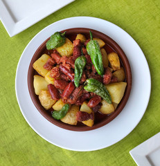 Spanish chorizo with potatoes and Padron peppers.